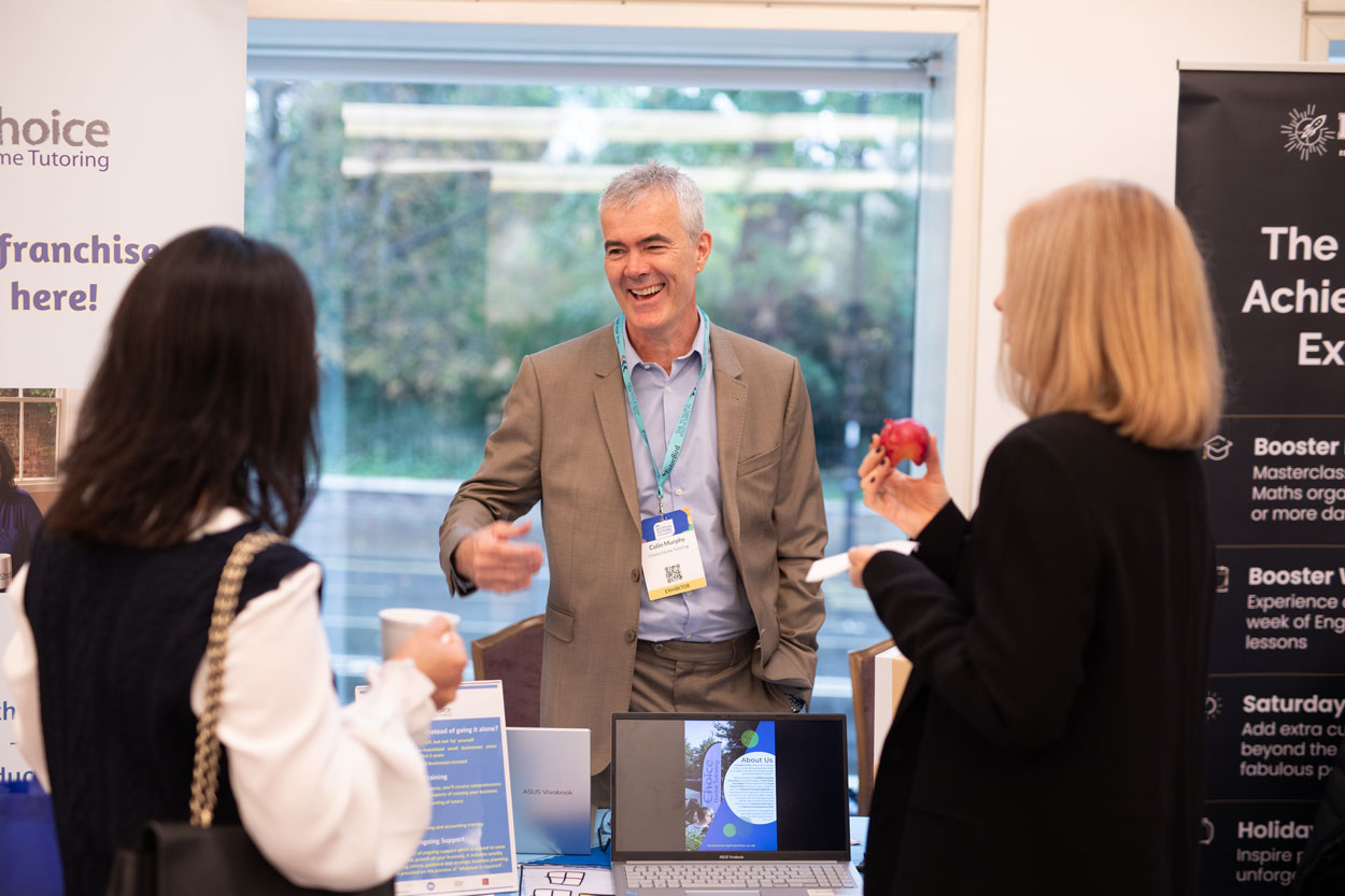 Colin wearing lanyard at exhibition